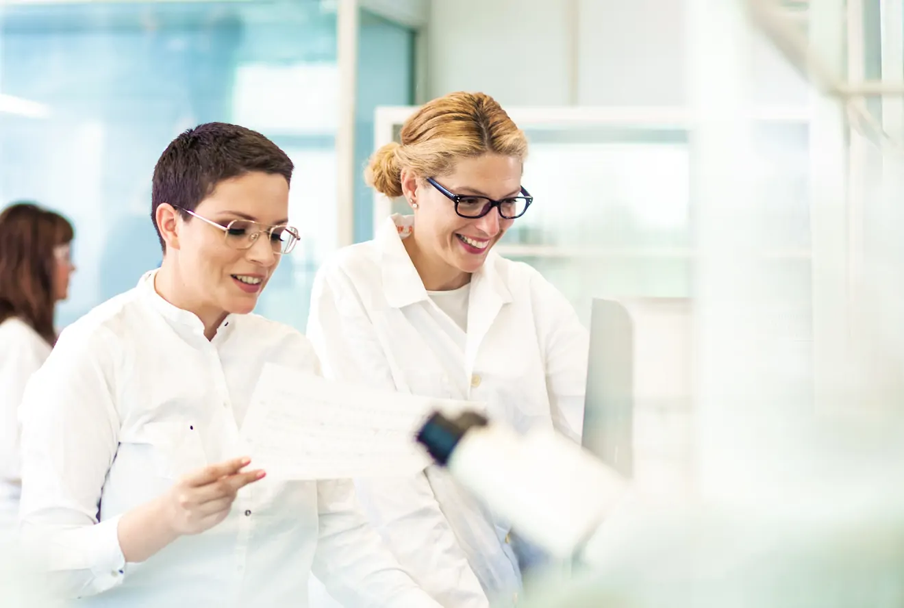 women working together in lab setting